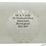 Envelope front of RSVP in Ivory with Golden Crown Design