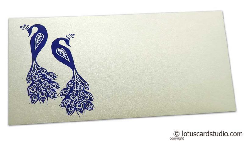 Front view of Money Envelope in Ivory Pearl with Blue Peacocks