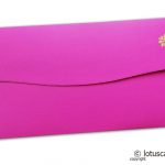 Back view of Shagun Money Envelope with Swirl Design and Golden Flowers on Mexican Pink