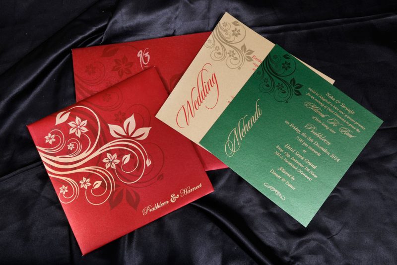 Wedding Card in Royal Red with Golden Floral Design