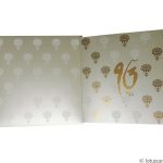 Envelope and card front of Lotus Themed Metallic Wedding Invitation Card