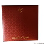 Envelope front of Beautiful Paisley Theme Royal Red Wedding Card