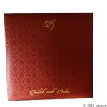 Envelope front of Beautiful Paisley Theme Royal Red Wedding Card