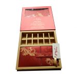 Card and box inside of Boxed Wedding Invite in Red with Golden Floral Pattern