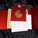 Card and inserts of Boxed Wedding Invitation Card in Red with Motif Design