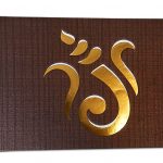 Card front of Golden Laser Cut Ganesha Hindu Wedding Invitation