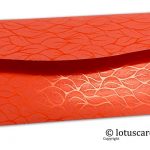 Back view of vibrant foil metallic orange shagun envelopes