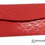 Back view of vibrant foil metallic red shagun envelopes